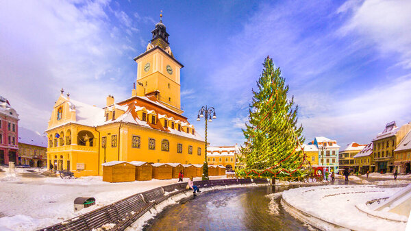 Christmas market and decorations tree in the main center of Brasov city, Transylvania, Romania