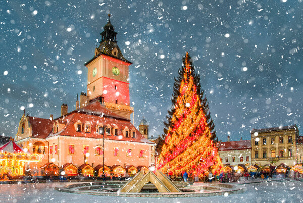 Christmas market and decorations tree in center of Brasov town, Transylvania, Romania 