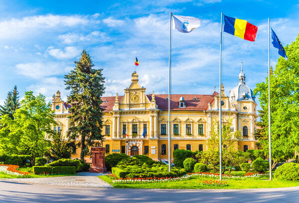 Prefecture building and central park in Brasov, Transylvania, Romania