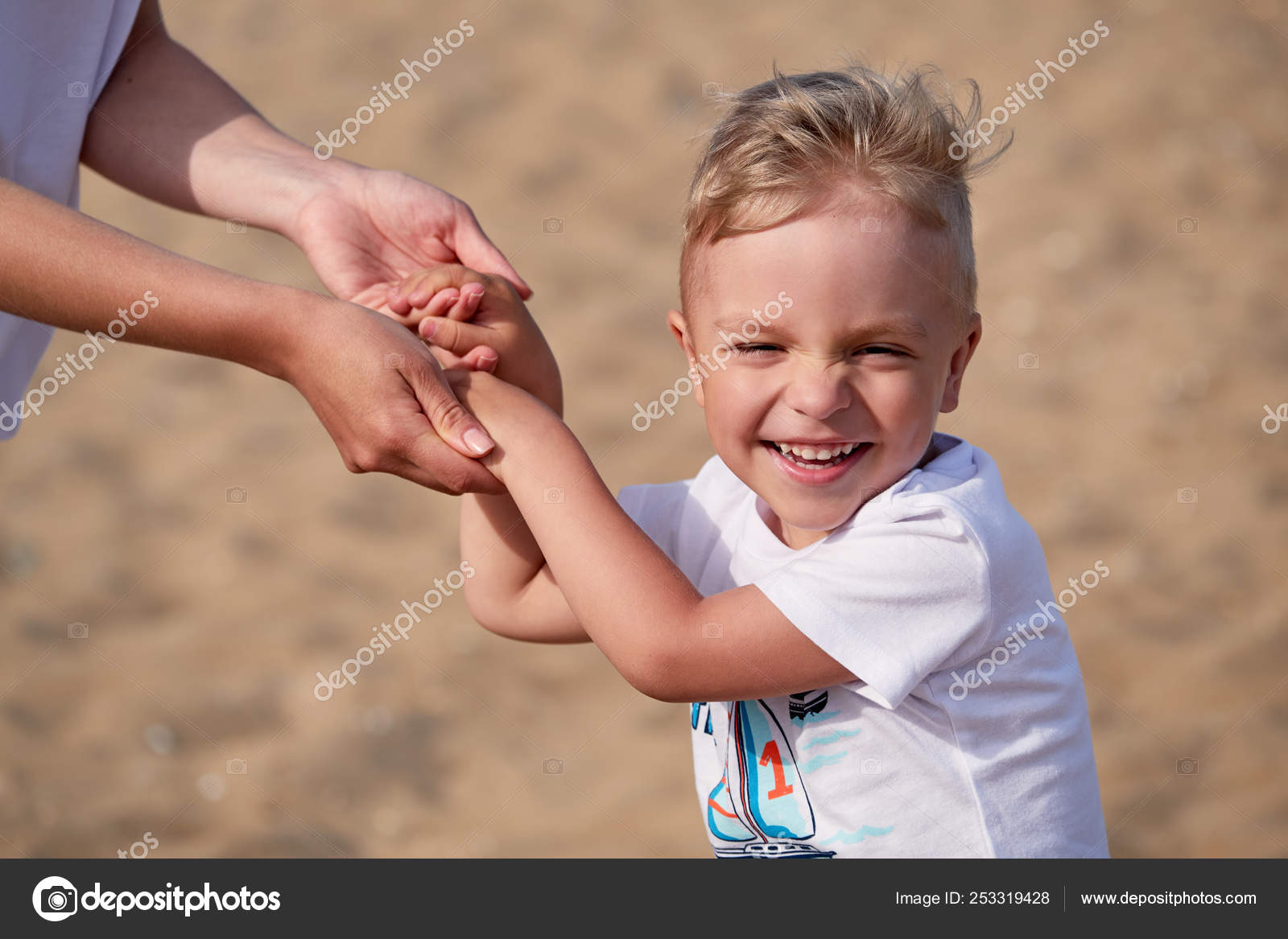 Portrait Laughing Child Holding Mother Hands Summer Family Day With Parent Attractive Face Little Boy Background Of Sand Beach Caucasian Kid Smiling Stock Photo By C Valendina
