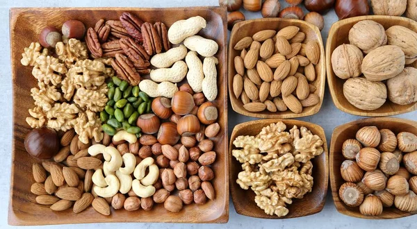Verschiedene Arten Von Nüssen Holzschalen Gesunde Ernährung — Stockfoto