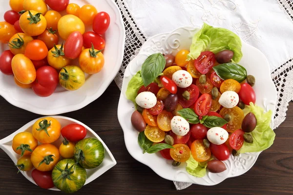 Salad Colorful Tomatoes Mozzarella Cheese Olives Capers Basil Top View — Stock Photo, Image