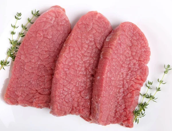 Beef sirloin steaks.