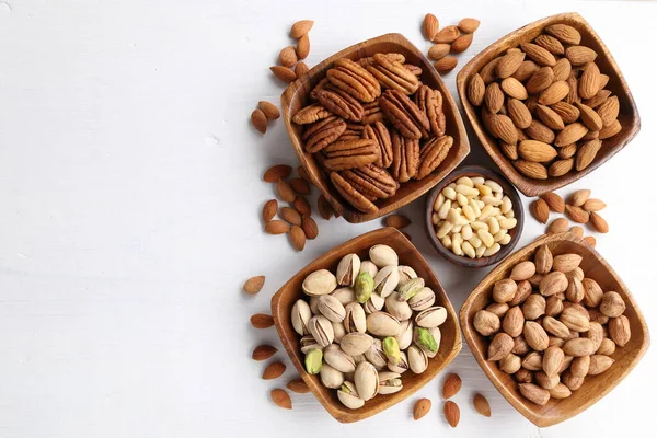 Different Kinds Nuts Wooden Bowls — Stock Photo, Image