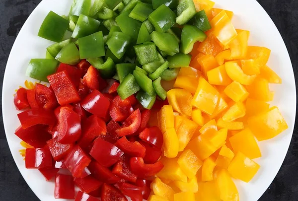 Sliced Colorful Peppers Plate Top View — Stock Photo, Image