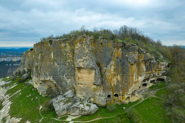 Cave city Tepe-Kermen, near the city of Bakhchisaray, Crimea. Aerial drone shot — Stock Photo, Image