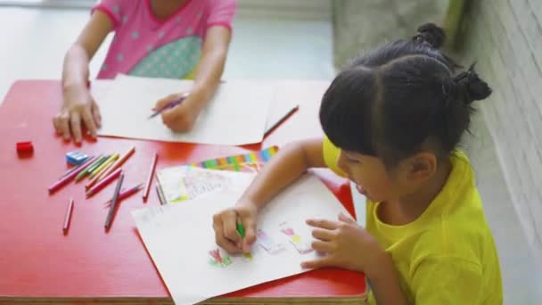 Asian Children Little Girls Studying Lessons Home Writing Notebook — Stock Video