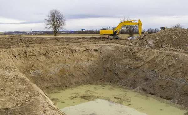 Excavator Big Hole Loamy Construction Site — Stock Photo, Image