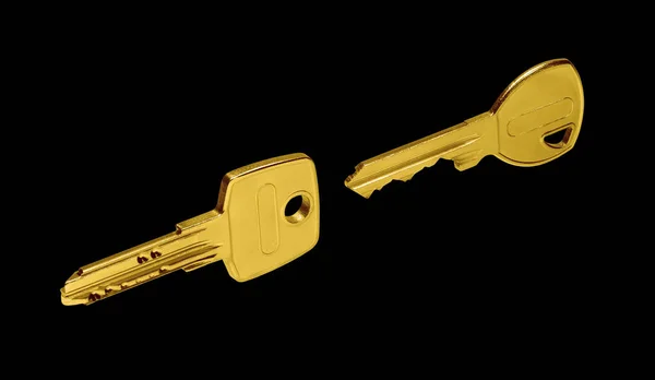 Two Modern Golden Colored Keys Isolated Black Back — Stock Photo, Image