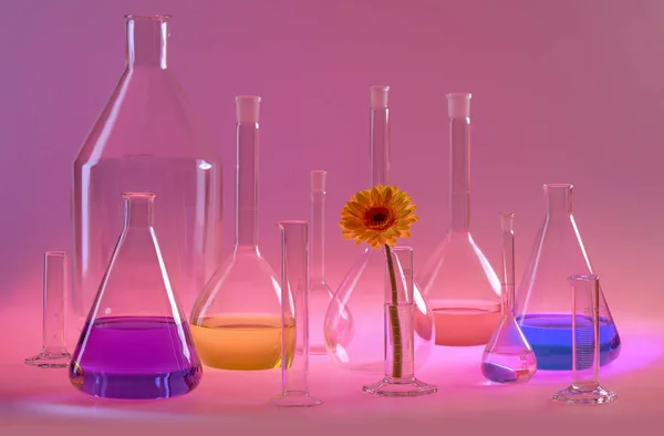 Reddish Illuminated Scenery Showing Variety Partly Filled Laboratory Glassware Including — Stock Photo, Image