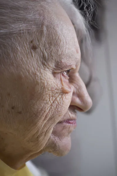 profile of an elderly woman