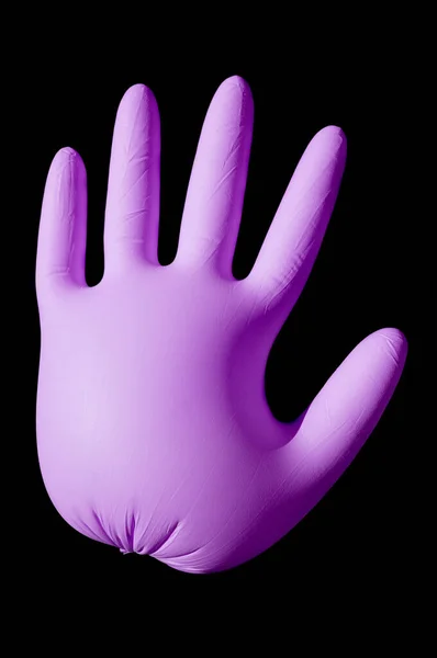 pink hand balloon with surgical glove, on the black background