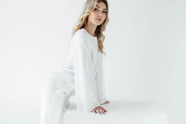 Side View Beautiful Blond Woman White Clothing Looking Camera Isolated — Stock Photo, Image