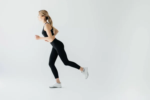 Side View Young Athletic Sportswoman Running Isolated Grey — Stock Photo, Image