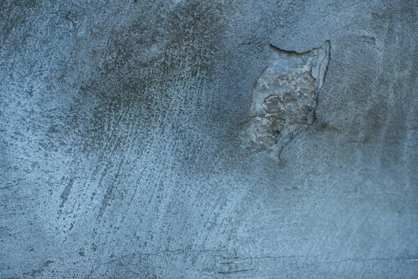 крупным планом вид пустого серого плохо выветриваемого фона
