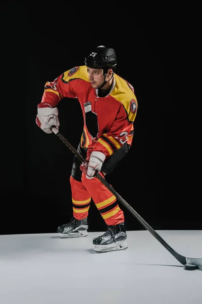 Full Length View Professional Sportsman Playing Hockey Looking Away Black — Stock Photo, Image