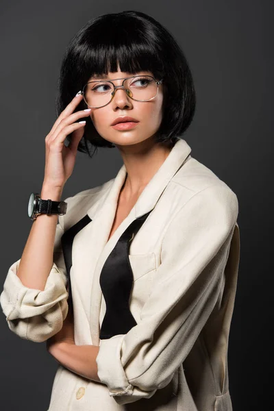 Attractive Young Woman Stylish Jacket Eyeglasses Looking Away Isolated Grey — Stock Photo, Image