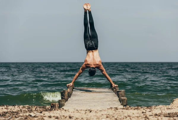 Handsome Shirtless Man Performing Handstand Wooden Pier — Stock Photo, Image