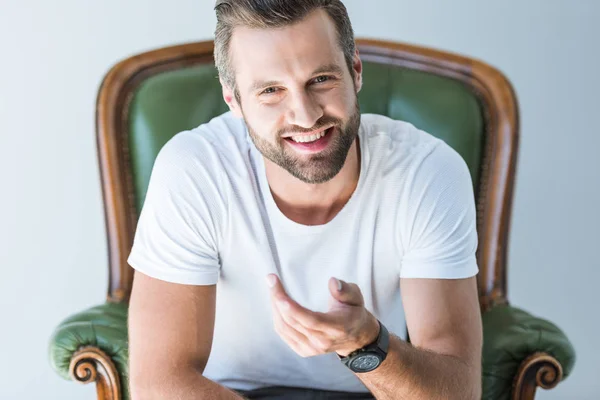 Hombre Alegre Sentado Sillón Verde Aislado Blanco — Foto de Stock