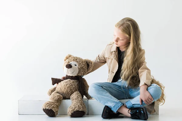 Full Length View Cute Stylish Child Sitting Looking Teddy Bear — Free Stock Photo