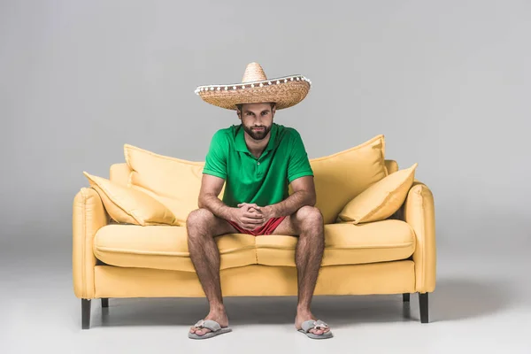 Handsome Bearded Man Mexican Sombrero Yellow Sofa Grey — Stock Photo, Image