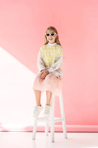 Adorable Stylish Cheerful Kid Sunglasses Sitting Stool Pink — Stock Photo, Image