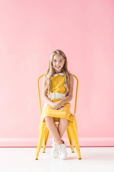 Happy Fashionable Adorable Youngster Sitting Yellow Chair Pink — Stock Photo, Image