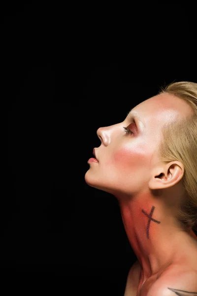 Profile portrait of beautiful young woman with makeup, isolated on black — Stock Photo