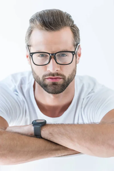 Portrait of bearded brunet man in eyeglasses, isolated on white — Stock Photo