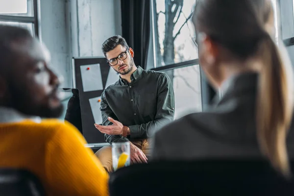 Multicultural managers during meeting in office — Stock Photo