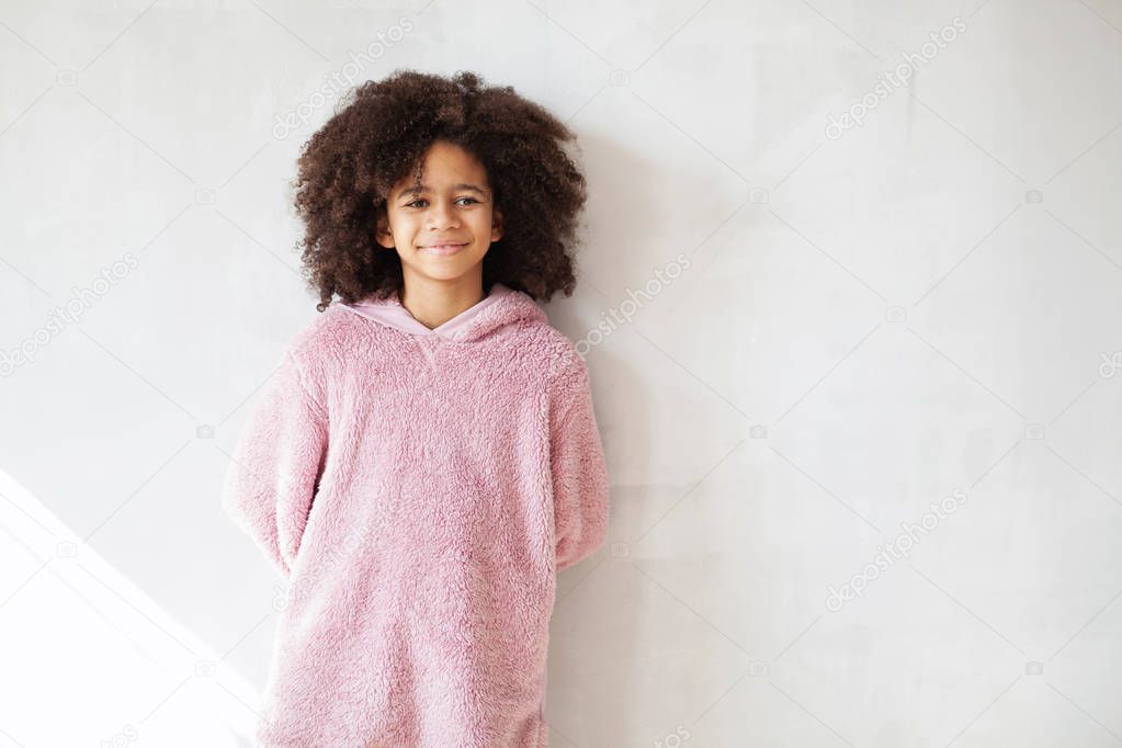 Cute girl in soft cosy hoodie