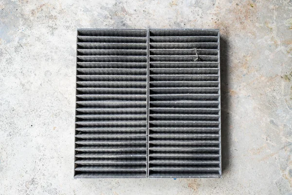The dirty car air filters that have been used for a long time.