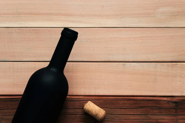 Bottiglia Nera Vino Rosso Tavolo Legno Nuovo Rosso Bellissimo Sfondo — Foto Stock