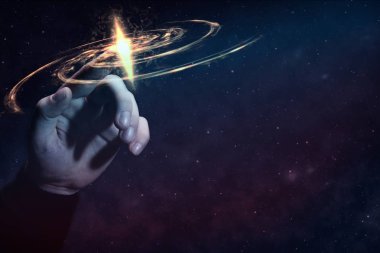 İşaret parmağı sonsuz uzayda yeni bir yıldız dokunur.