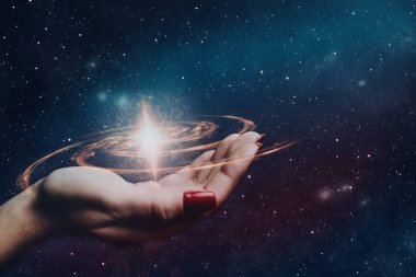 Elini sonsuz uzayda yeni bir yıldız tut. Karışık teknik.