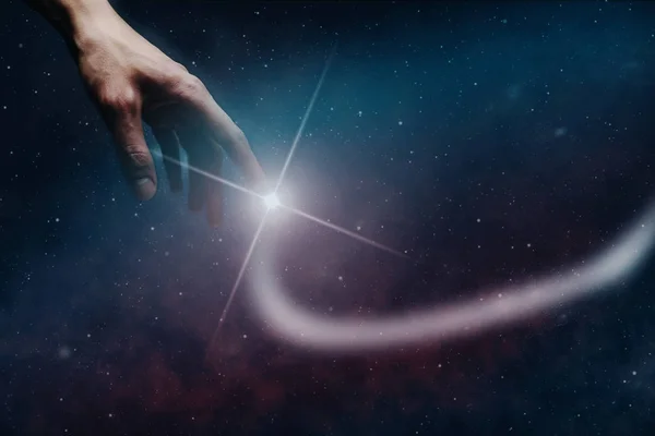 Forefinger touches a new star in infinite space.