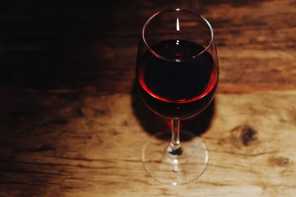 Glass of red wine on a table. Beautiful white background