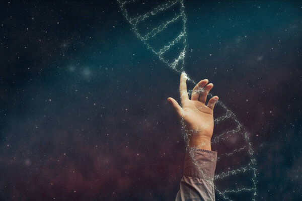 Close up of human Touching DNA molecule. Nebula dust in infinite space. Mixed media.