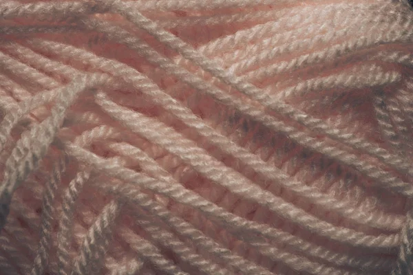 bundles of woolen threads background. Macro view.