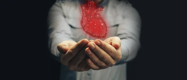 Ludzką Ręką Trzymając Neon Czerwony Serce Innowacyjnych Technologii Techniki Mieszane — Zdjęcie stockowe