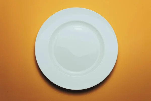 White Bowl Fork Spoon Orange Background — Stock Photo, Image