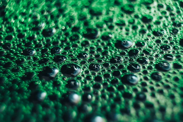 Beautiful green bubbles background . Macro view.