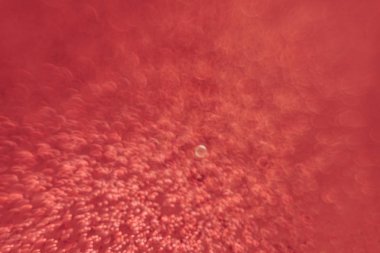 Soyut bir arka plan üzerinde güzel kırmızı bokeh.