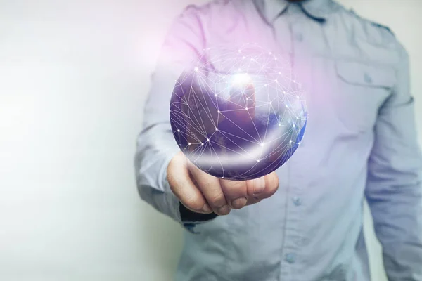 Human touching planet with finger and network web on a white background. Mixed media.