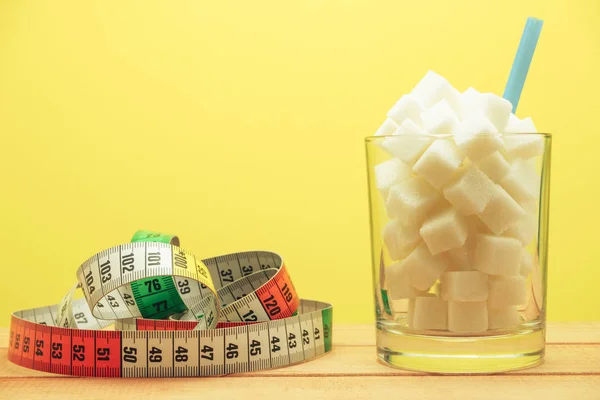 Glass Full Cubes Sugar Straw Wooden Table Beautiful Yellow Background — Stock Photo, Image