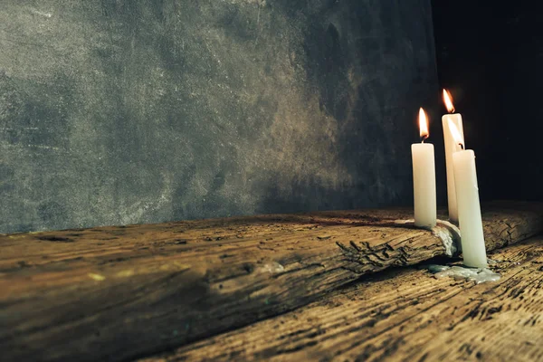 Close Beautiful Burned Candles Old Oak Wooden Table Dark Gray — Stock Photo, Image