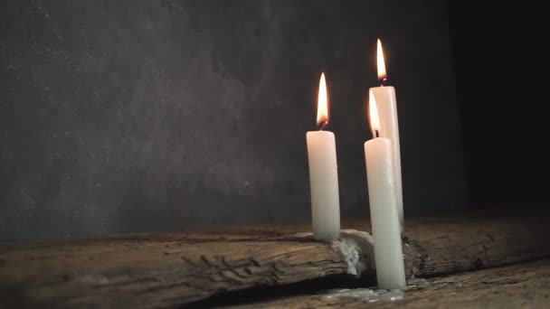 Close Beautiful Burned Candles Old Oak Wooden Table Dark Gray — Stock Video