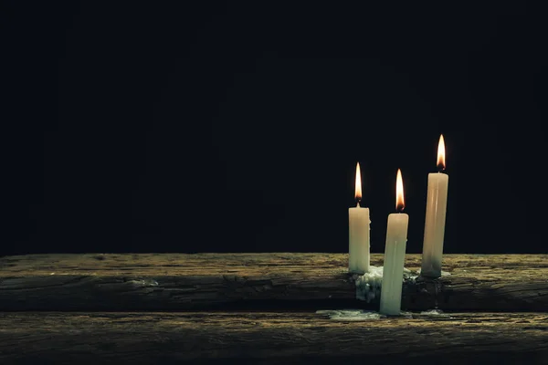 Beautiful Three White Burned Candles Old Oak Wooden Table Black — Stock Photo, Image