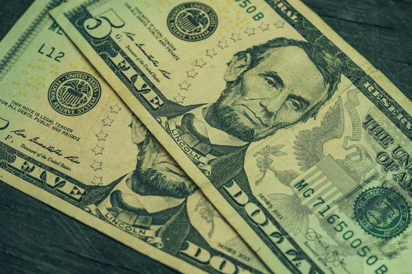 Faccia Lincoln Vicino Uno Sfondo Cinque Dollari Cinque Americani Banconote — Foto Stock