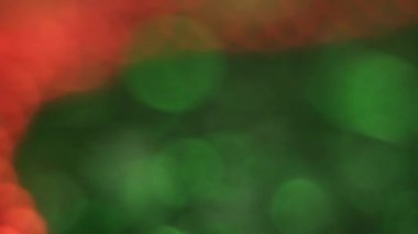 Güzel Noel kırmızı ve yeşil bokeh arka plan.